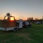 landing luchtballon zonsondergang